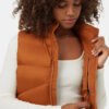 snug-north-orange-quilted-vest-womens-exclusive-2